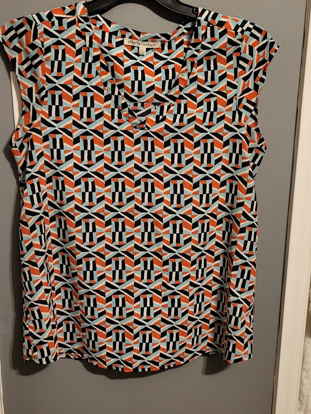 Daniel Rainn Geometric Print Cap Sleeve Blouse in Orange, Black & White